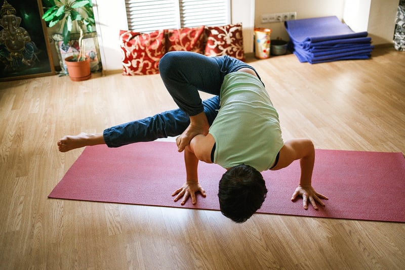 Woman practicing bedtime yoga